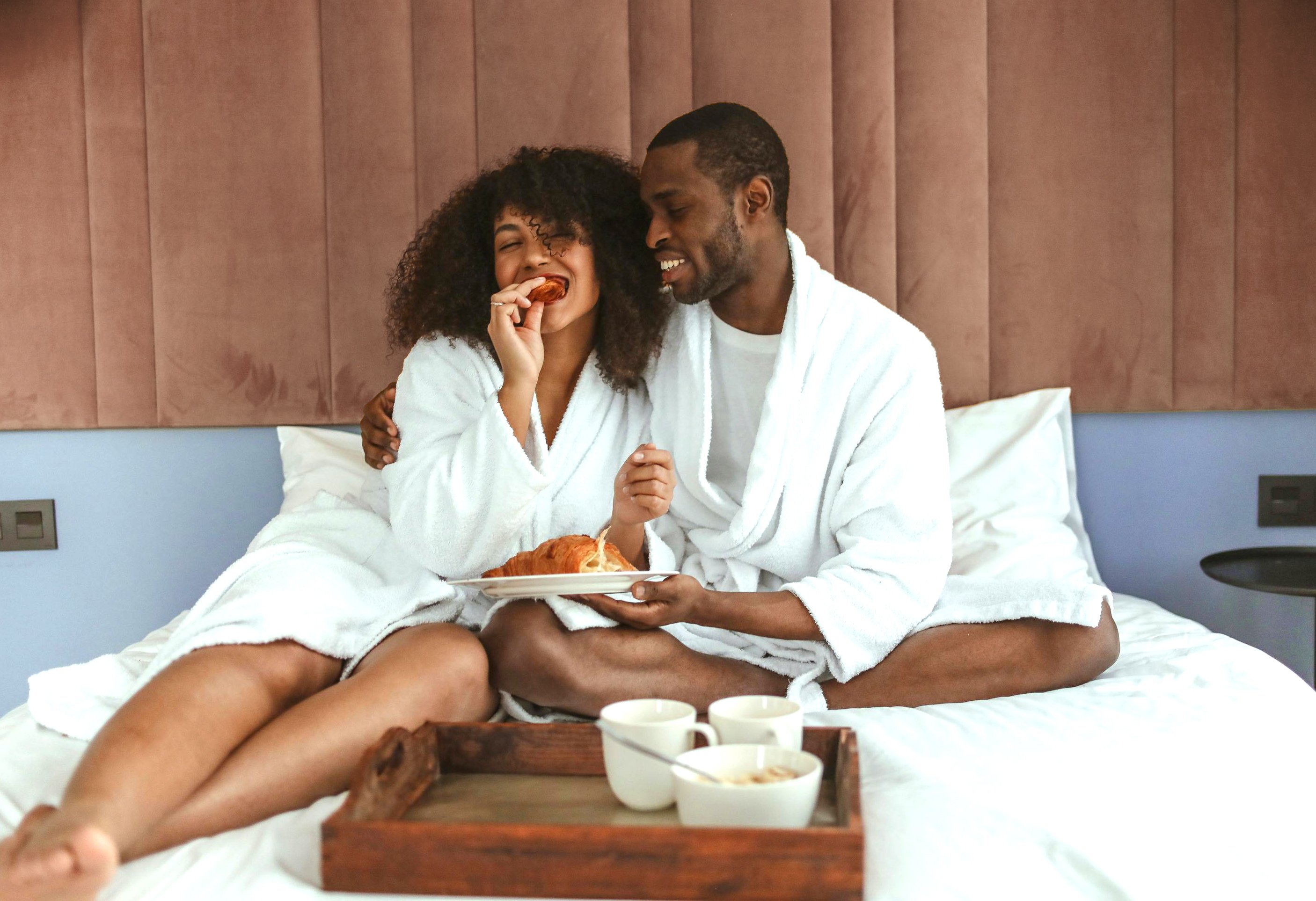 Couple planning a trip using points credit cards